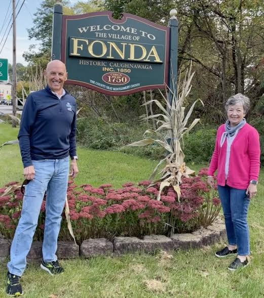Village Historian Beverly Guiffre welcoming descendants of the Fonda family at the Welcome to the Village of Fonda sign